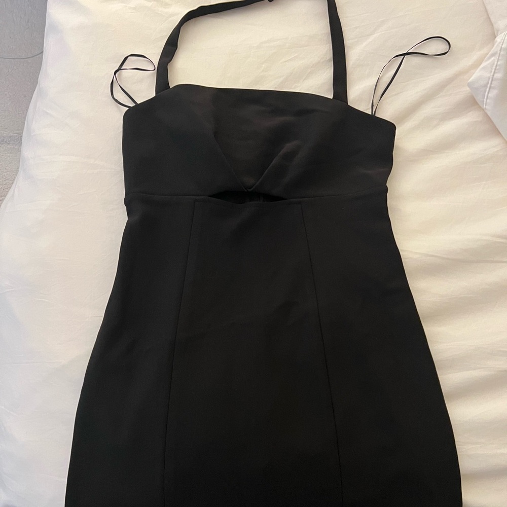 Finders Keepers black dress with hole under boob area.